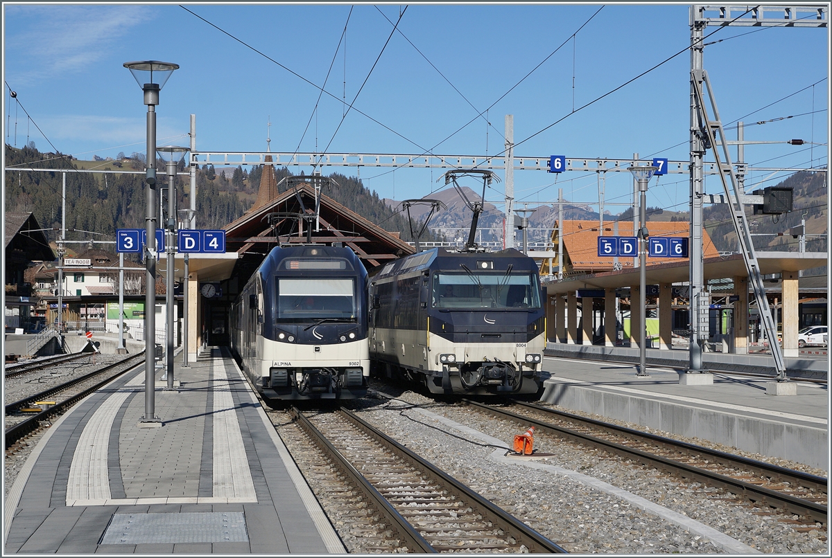 Langsam gewöhnt man sich an die  neue  MOB... 
Der MOB Alpina ABe 4/4 9302 und die MOB Ge 4/4 8004 in Zweisimmen. 

25. Nov. 2020