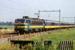 Am 25 Juli 1996 passiert NMBS 2124 mit der Int.1138 die Belgisch-Niederlandische Grenze bei Eijsden.