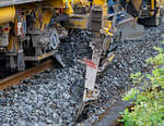   DETAIL-Bild:  Die Plasser & Theurer Schnell-Schotterplaniermaschine SSP 110 SW,  Schweres Nebenfahrzeug Nr.