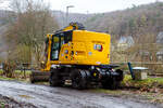 R�ckansicht von dem Caterpillar CAT M323F Zweiwegebagger mit hydrostatischem Schienenradantrieb (Serien-Nr.
