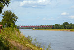   Eine DB 182er (Siemens ES 64 U2) überquert, mit einem Regionalzug, die Elbe über die Herrenkrug-Brücke in Magdeburg-Herrenkrug am 21.05.2016.