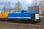   Die V 100-SP-008 (92 80 1203 128-4 D-SLG) der SLG Spitzke Logistik GmbH, ex DR 110 529-5, ex DR 112 529-3, ex DR 202 529-4, ex DB 202 529-4, ist am 08.02.2016, mit der Krupp-Gleisbohrramme, beim