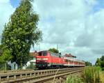 218 161-8 Schub von Nahverkehrszug in Vöhringen am 09.07.2009.