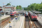 650 325-4 und 642 093 und 218 260-8 mit Nahverkehrszug in Memmingen am 21.05.2009.