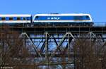 Abwechslung bringt die Vogtlandbahn mit Ihren ALEX-Z�gen: Hier VBG 223 068-8 vor ALX 84115 Hof - M�nchen, KBS 855 Regensburg - Hof, fotografiert auf dem Th�lauer Viadukt am 28.04.2012 