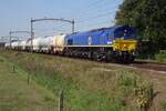 RailTraxx 266 009 zieht der Millinger Kesselwagenzug durch Hulten am 2 September 2022.