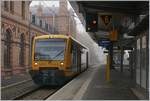 Der ODEG VT 650.86 als RB13 auf der Fahrt nach Rehna beim Halt im nebligen Schwerin.