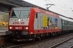 Am Morgen des 05.10.2013 bei str�menden Regen zieht die CFL 4017 (eine TRAXX  P140AC1 modifizierte DB BR 185.1) einen Sonderzug des Luxemburgischen Vereines G.A.R (Groupement des Amis du Rail) durch