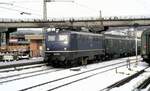 110 112-0 mit Packwagen Dms 905 in Ulm am 30.11.1980.