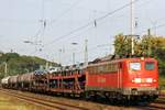 Am 21 Mai 2005 durchfahrt ein Mischguterzug mit 140 002 Köln West.