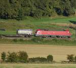 182 015-8 mit Containerzug bei Urspring am 26.08.2007.