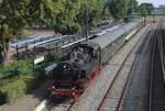 Vom F�ssgangerbr�cke in Dieren wird am Morgen von 3 September 2023 die -20 Minuten versp�teter-  Einfahrt der 1.VSM Pendelzug mit 64 415 auf den Chip gebrannt.
