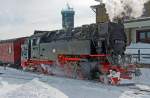  Die Neubau-Dampflok der Harzer Schmalspurbahnen HSB 99 7247-2 (ex DR 099 157-0, 99 0247-9, 99 247) erreicht am 23.03.2013 den Bahnhof Brocken (1.125 m ü.NN),  welcher sich knapp unterhalb des