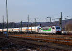 Die an die Cargologic AG (Kloten) vermieteten und bei der BLS Cargo AG eingestellten 186 910  (91 83 2186 910-2 I-BLSC) der AKIEM SAS, fährt am 03.03.2021 mit einem Kesselwagenzug durch Betzdorf