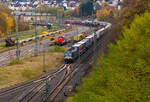 Die Siemens Vectron MS - X4 E - 644 /193 645 (91 80 6193 644-2 D-DISPO) der Beacon Rail Capital Europe GmbH, München (BRCE / DISPO) fährt am 13 November 2025 HELROM Trailer Zug Wien –