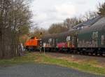Nun geht es �ber die Hellerbr�cke.....Die Lok 46 der KSW (Kreisbahn Siegen-Wittgenstein), eine Vossloh G 1700 BB, zieht ihren G�terzug in Richtung Neunkirchen-Salchendorf, hier am 11.04.2012 in