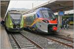 Und noch ein FS Trenitalia ETR 104, hier der ETR 104 242; daneben und Grund für das Bild ein Minuetto ME Ale 501 in der neuen Regionalzugfarbgebung.