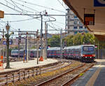 Im Sandwich zweier E.464 (gef�hrt von der E.464.397) erreicht der Trenitalia InterCity Notte ICN 1962, von Syrakus (Siracusa) nach Milano Centrale, p�nktlich den Bahnhof Catania Centrale.