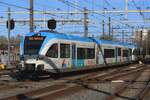 Arriva 380 -noch in die altere Breng-Farben- verlasst am 19 März 2026 Arnhem Centraal mit ein RB nach Winterswijk.