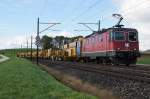 SBB: Zuf�llige Schlechtwetteraufnahme eines Bauzuges mit der Re 4/4 11327 bei Niederbipp am 8.