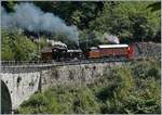 50 Jahre Blonay Chamby - MEGA BERNINA FESTIVAL: Trotz fehlendem Schnee eindrücklich: die RhB Dampfschneeschleuder X rot d 9214 (1052) mit der BFD HG 3/4 bei Vers-chez-Robert.