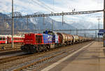  Die SBB Cargo Am 843 073-8 (eine modifizierte Vossloh MaK 1700) fährt am 20.02.2017 mit einem langen Kesselwagenzug (Wagen der Gattung Zans, laut Warntafel 30/1202 für/mit Heizöl /