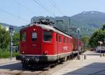 OeBB: Die Re 4/4 I 10009 mit dem Kehrichtzug bei der Einfahrt Oensingen am 7.