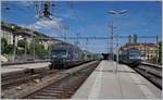 In Neuchâtel begegnen sich die beiden BLS Re 465 005 und 006 mit ihren RE Bern - La Chaux de Fonds und La Chaux de Fonds - Bern.