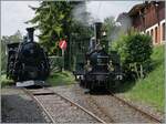 Während die BFD HG 3/4 N° 3 der Blonay Chamby Bahn in der Lokwartung kalt abgestellt ist, dampft die LEB G 3/3 N° 5 (Baujahr 1890) der Blonay Chamby Bahn zur Lokwartung und lässt