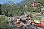 Der TMR BDeh 4/8 21 ist als R85 18951 auf dem Weg von Vallorcine nach Martigny und hat den Bahnhof von Les Mar�cottes erreicht, wo ein Busanschluss

 11. Juli 2026