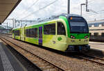 Der (TPC) AOMC/ACD Beh 2/6 542, ein Stadler SURF, steht am 28 Mai 2023 im Bahnhof Aigle zur Abfahrt nach Champéry bereit.