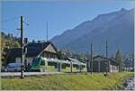 Vor dem Hintergrund mächtiger Berge wartet der TPC ASD ABe 4/8 472 in Les Diablerets auf die Abfahrt als R71 431 nach Aigle.