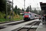 RhB Ge 4/4 III Nr.650 mit Werbung UNESCO in Bergün am 29.08.2009.