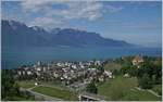 Ein SBB RABe 511 fährt als RE in Clarens durch oder ein sehr kniffliges  Bahnsuchbild .