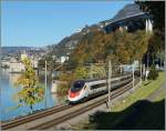 Ein SBB ETR 610 als EC 52 von Milano Centrale nach Genève beim Château de Chillon.