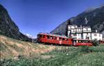 RhB ABe 4/4 mit Bernina-Express bef�hrtdas Kehrviadukt bei Brusio im August 1989.