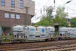 Vierachsiger 47 m³ Uacs Tankwaggon (rumänischer Bauart) für Schüttgut, mit vier Tanks, mit einseitiger unterer Entleerung, mit innerem Auflockerungsring und mit Lufteinspeisung